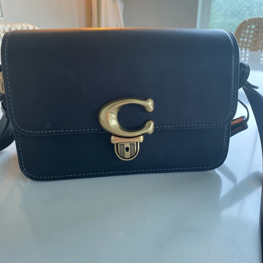 Coach Black and Gold Crossbody Bag with Sleek Design